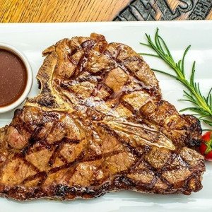 10% cashback din nota de plată în restaurant la Red Angus Steakhouse